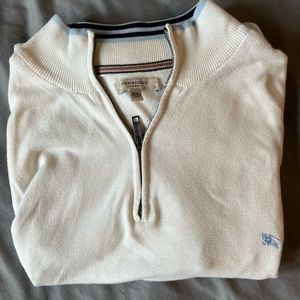 Cream colored Burberry pullover sweater
